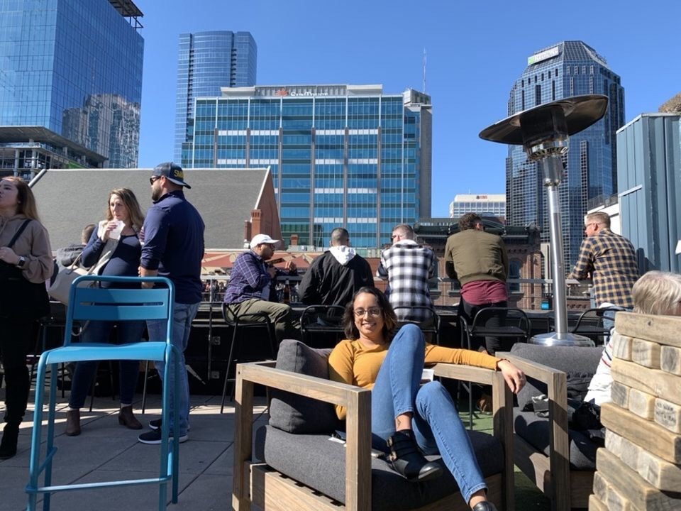 Stacy enjoying a rooftop restaurant view in Nashville, Tennessee.
