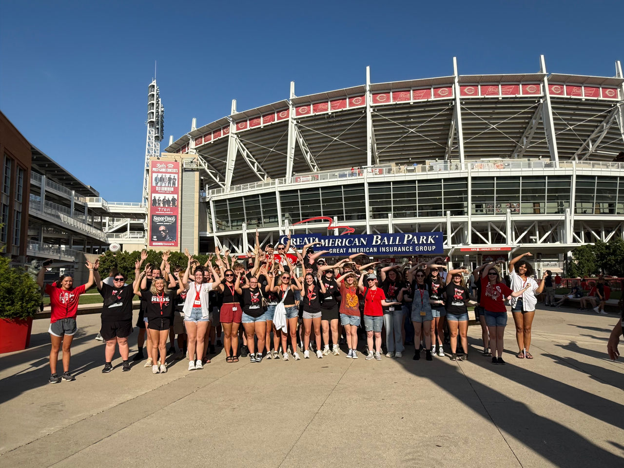 UC Futures students cheering at a Reds game